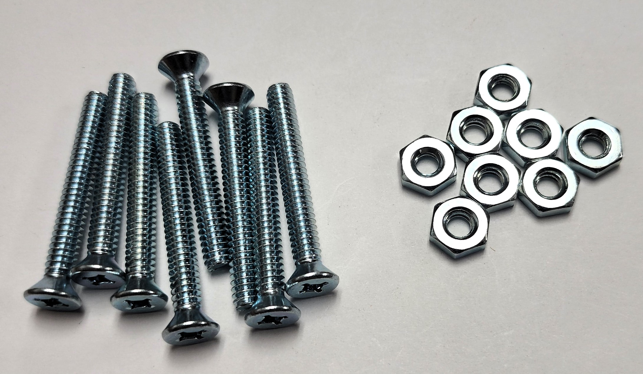 1-1/2" 10-24 FLAT-HEAD MACHINE SCREW w/ HEXAGON NUT - ZINC-COATED (8 PACK) - Kilrich Building Centres
